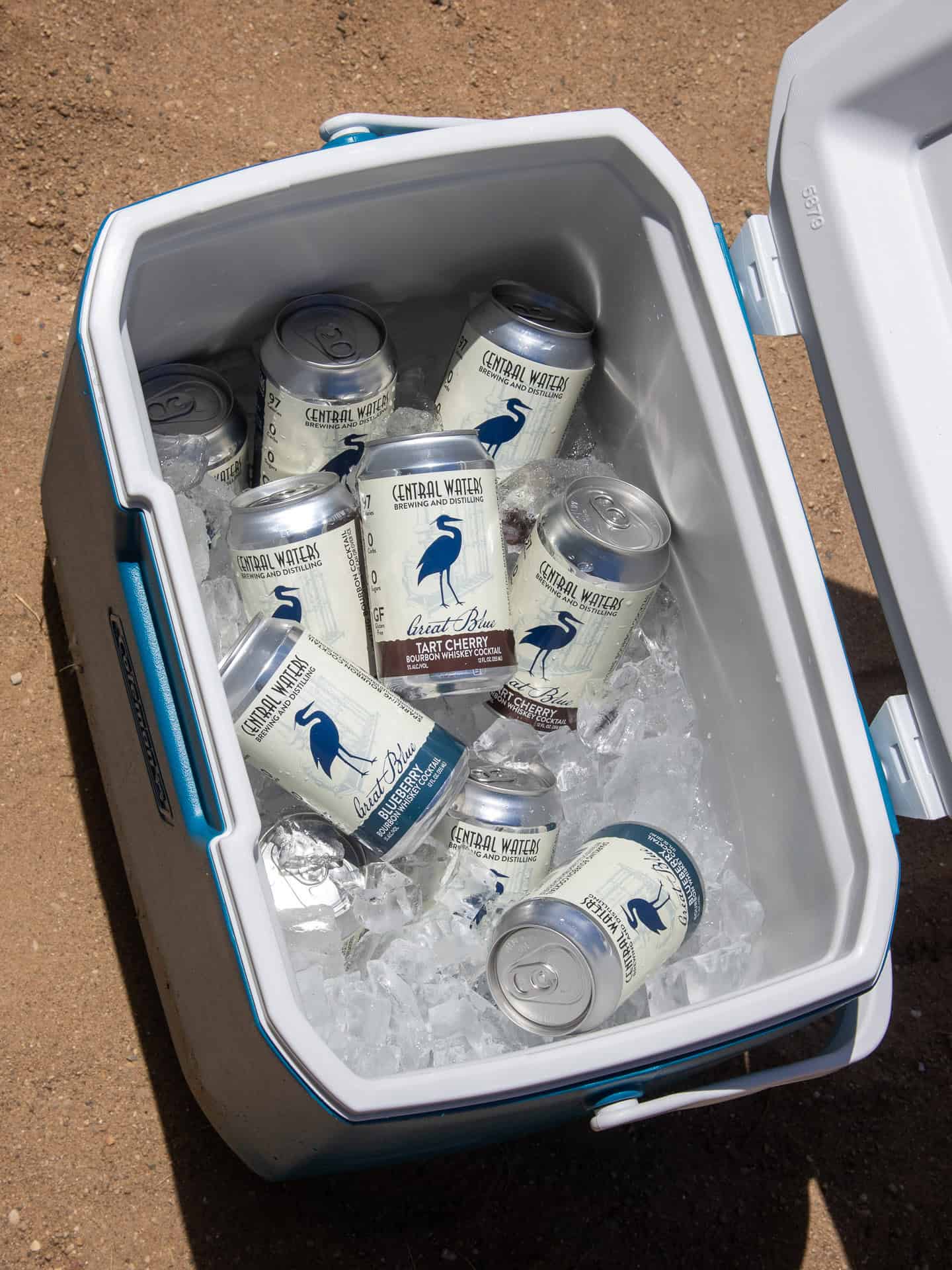 Cooler full of Great Blue cans on ice