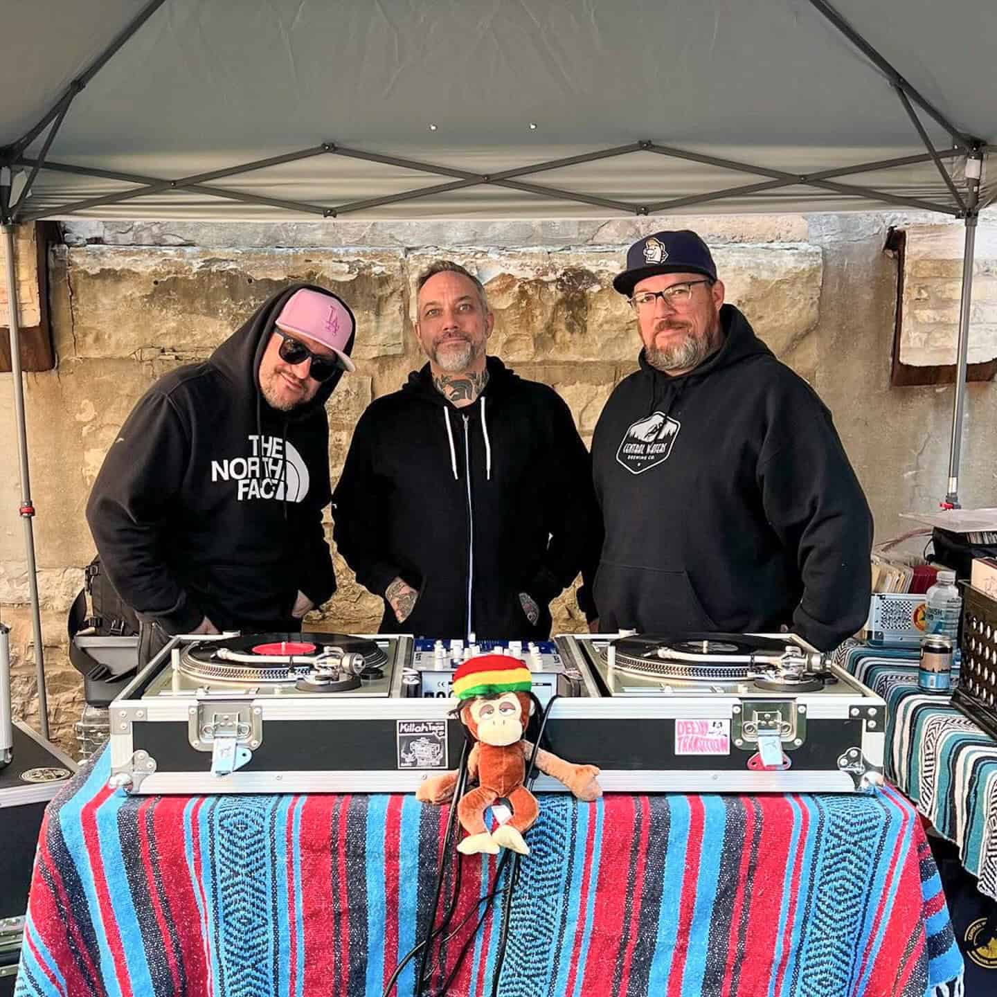 DJ spinning vinyl records at the taproom